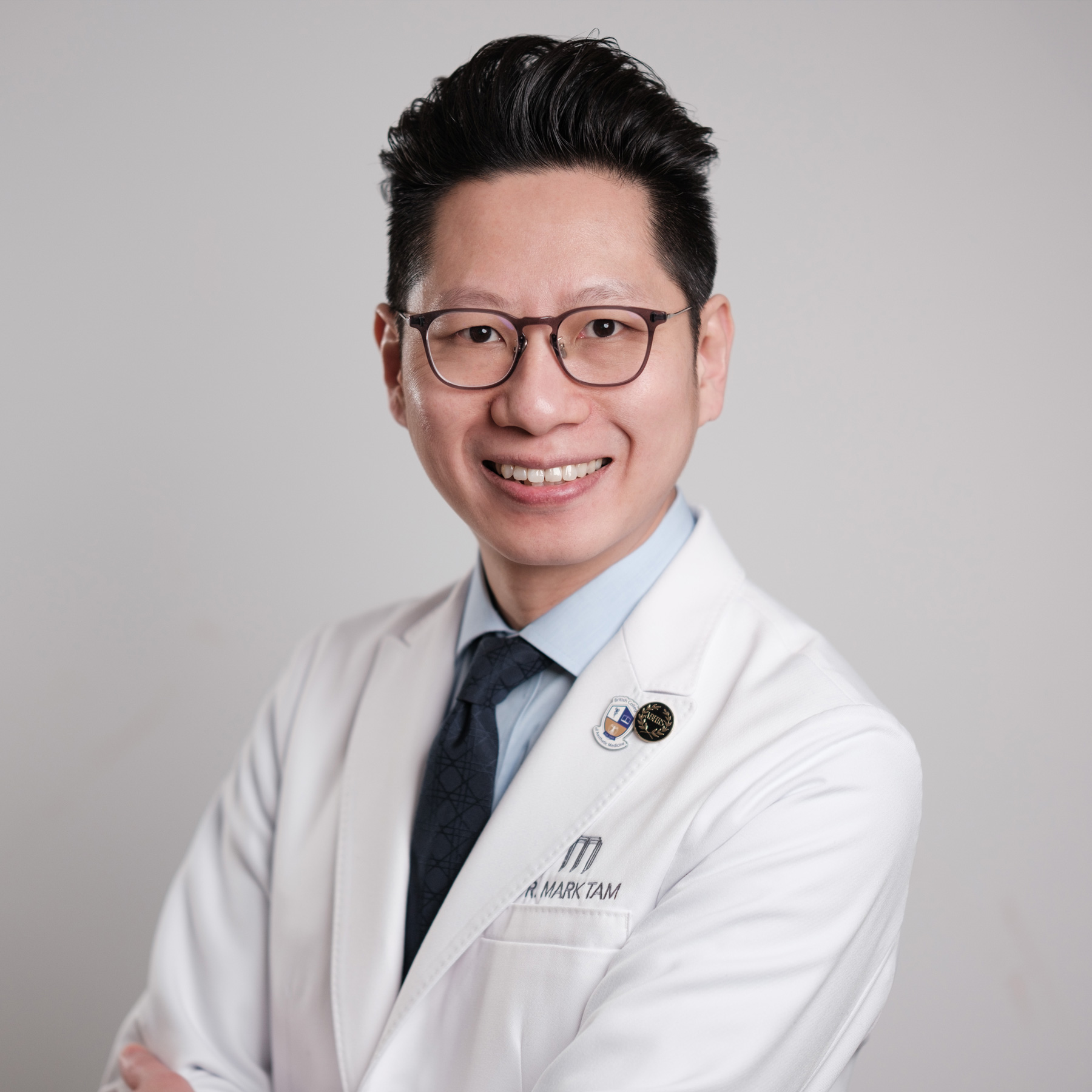 Dr Mark Tam